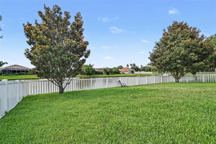 Back yard fenced in on the lake