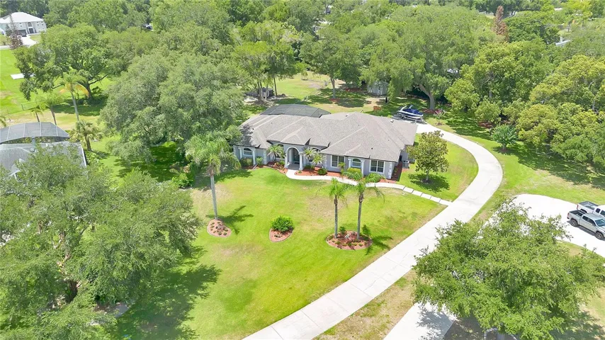 Gorgeous private driveway leading to the garage and more parking!