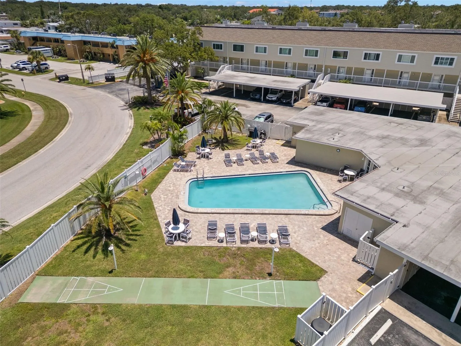 Clubh house, heated pool, shuffle board court and street view
