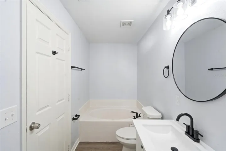Primary Bath, renovated, garden tub, walk in shower, updated toilet, vanity