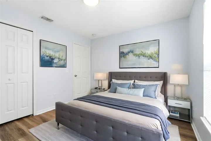 Primary Bedroom, LVP floor, ceiling fan, walk in closet