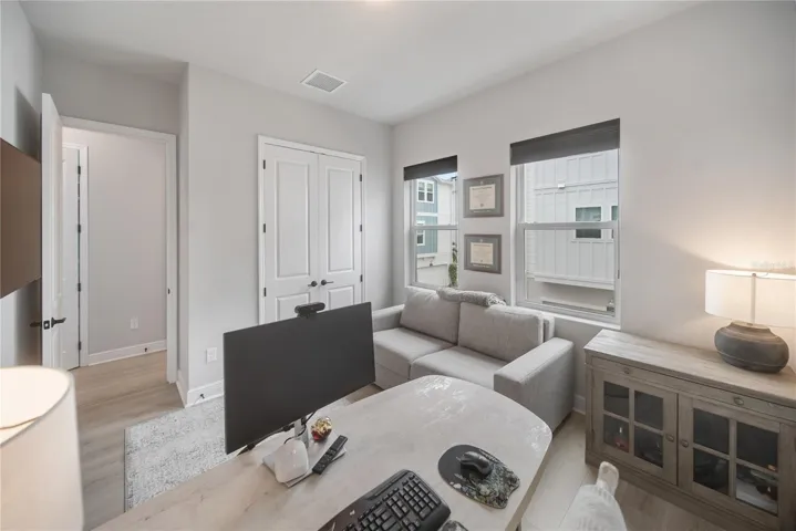 Office/bedroom adjacent to bathroom.