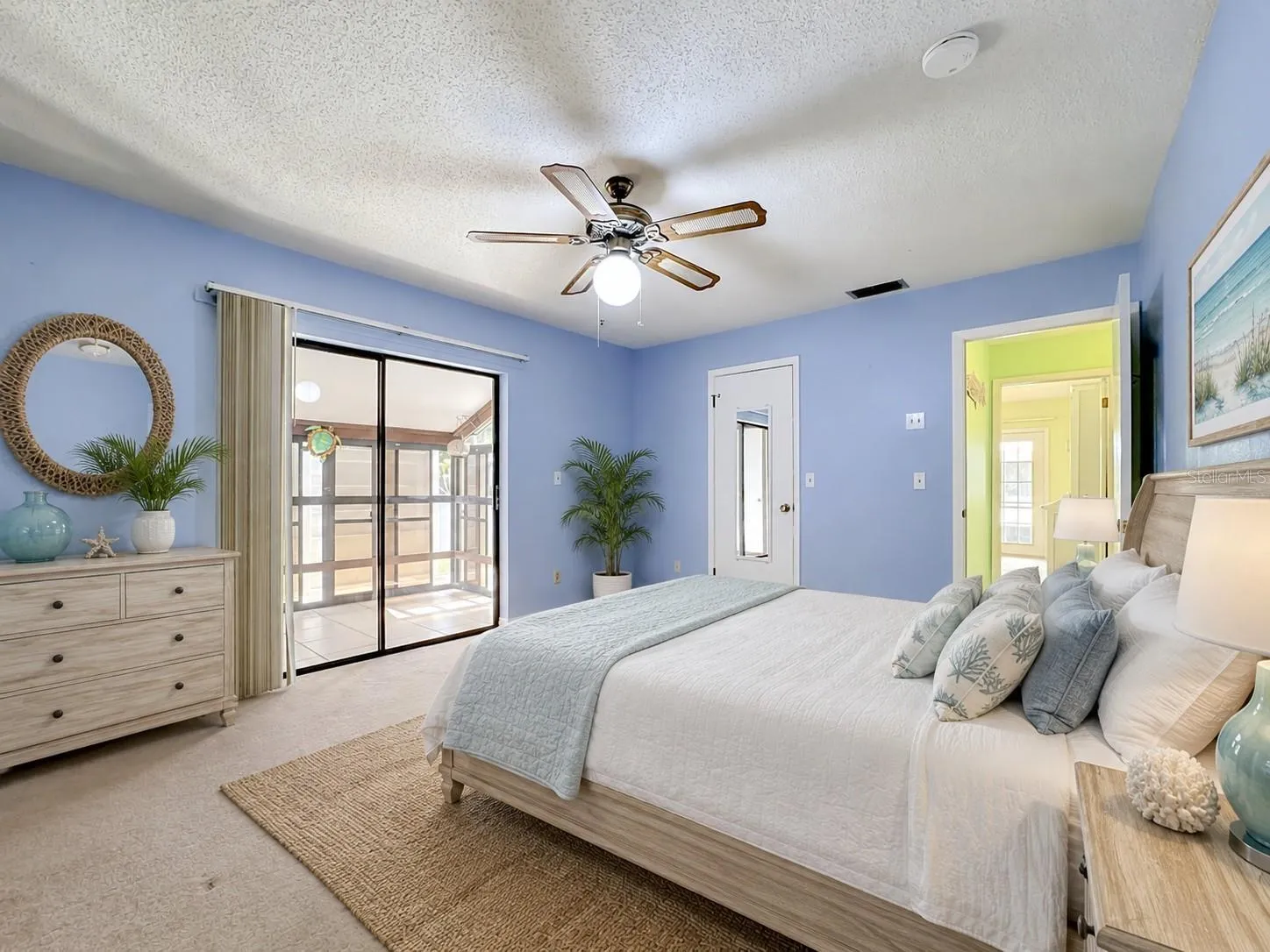 Owners suite with private back lanai area. Virtual staged