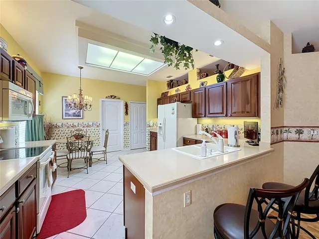 Kitchen has Corian counter tops