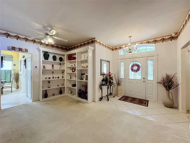 Built in cabinets and entry to kitchen