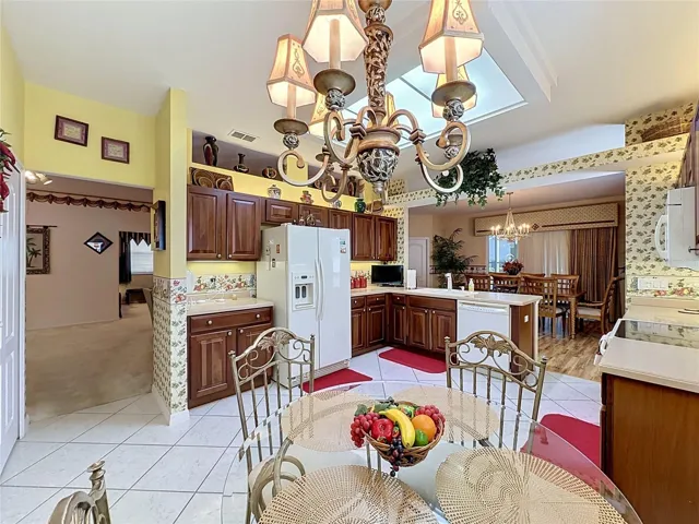 Kitchen has wood cabinetry