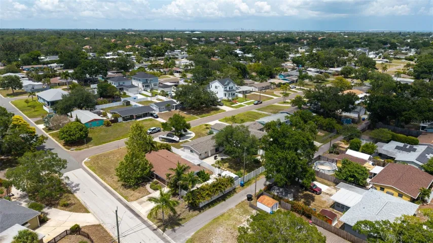 Aerial view of alley access to the back of the home.