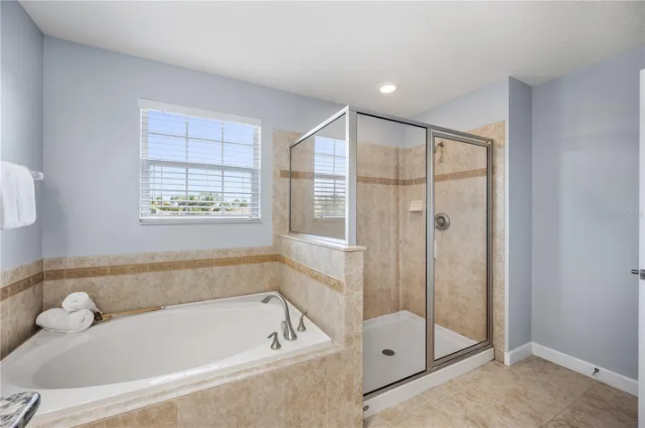 Primary Bathroom with soaking tub and shower