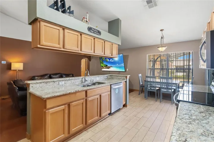 Kitchen with Dinette and Island overlooking Living Room