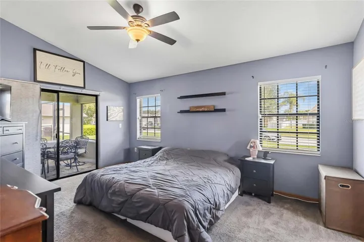 Primary Suite with Sliding Glass Doors to Rear Porch