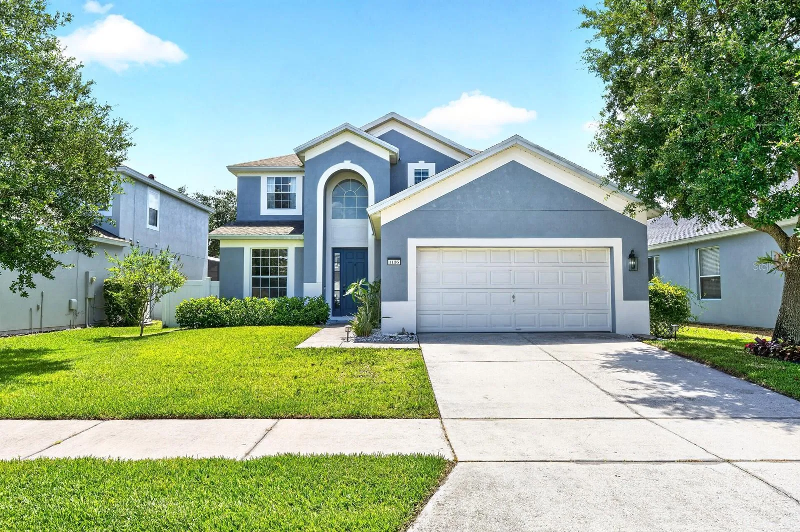 Room to grow, thoughtful UPDATES, and an incredible BACKYARD RETREAT make this spacious two-story home in the sought-after GUARD GATED COMMUNITY of Spring Isle one you won't want to miss!