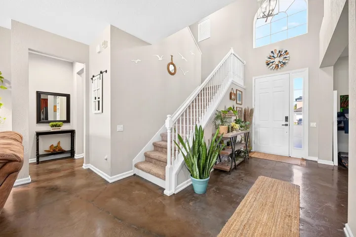 The light filled two story foyer welcomes you home!