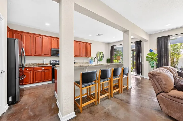 Large island with bar seating makes entertaining a breeze.