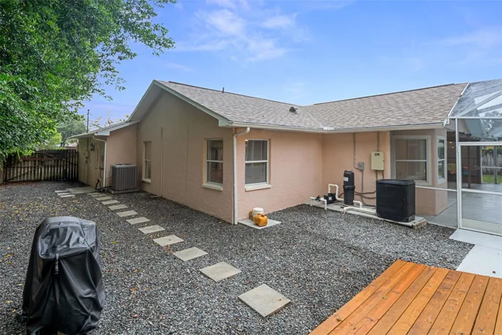 Gravel Side Yard perfect to bring a boat, jet ski or even a vehicle in the side yard or to the workshop