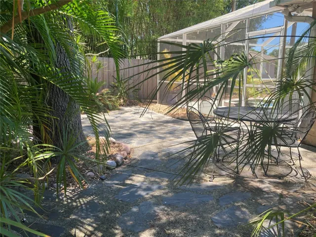 View of the outdoor patio outside the screen enclosure