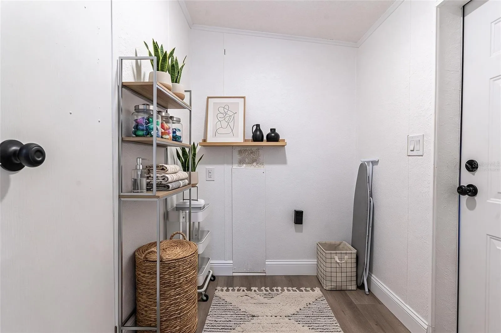 Laundry room. Virtually staged
