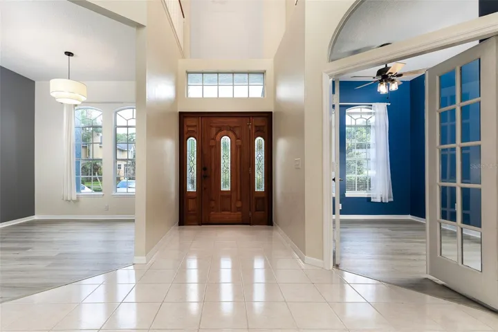 Entry door interior view showing dining area and office/5th bedroom option
