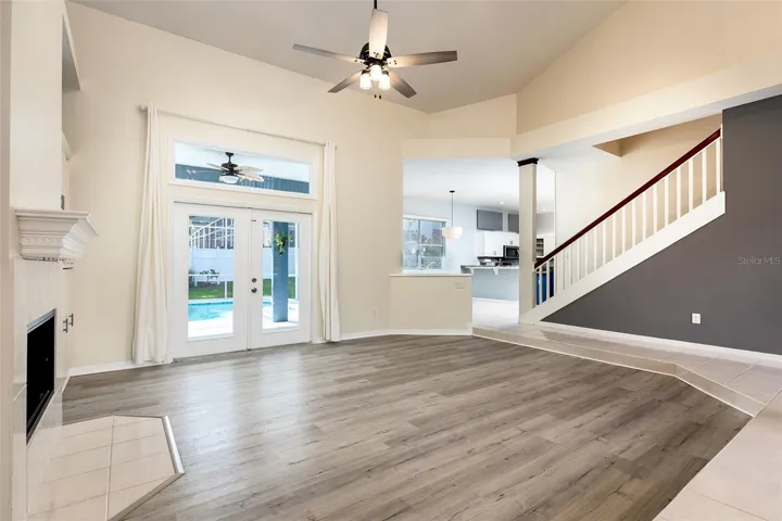 Living Room to kitchen and pool deck