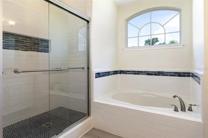 Large walk in shower and soaker tub