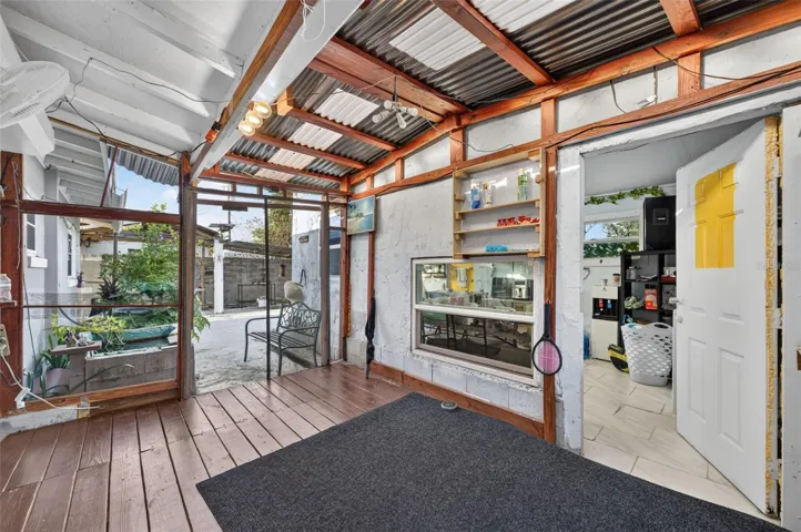 Detached space / storage. Owner has a kitchen in this enclosed space.
