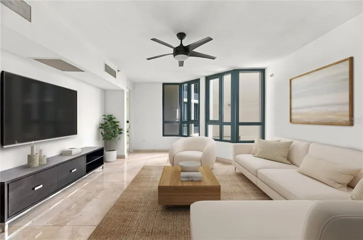 Den - This image has been virtually staged and does not reflect the current state of the property.