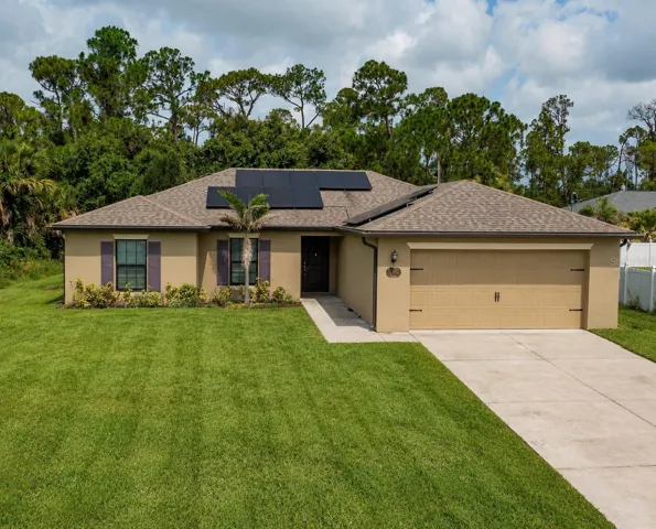Welcoming Front Exterior with Solar Savings & 2-Garage Virtually Staged