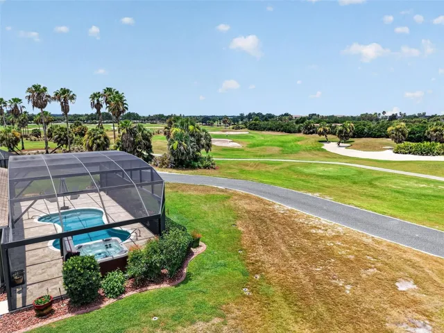 Aerial Side Elevation of Swimming Pool with Golf Front Views