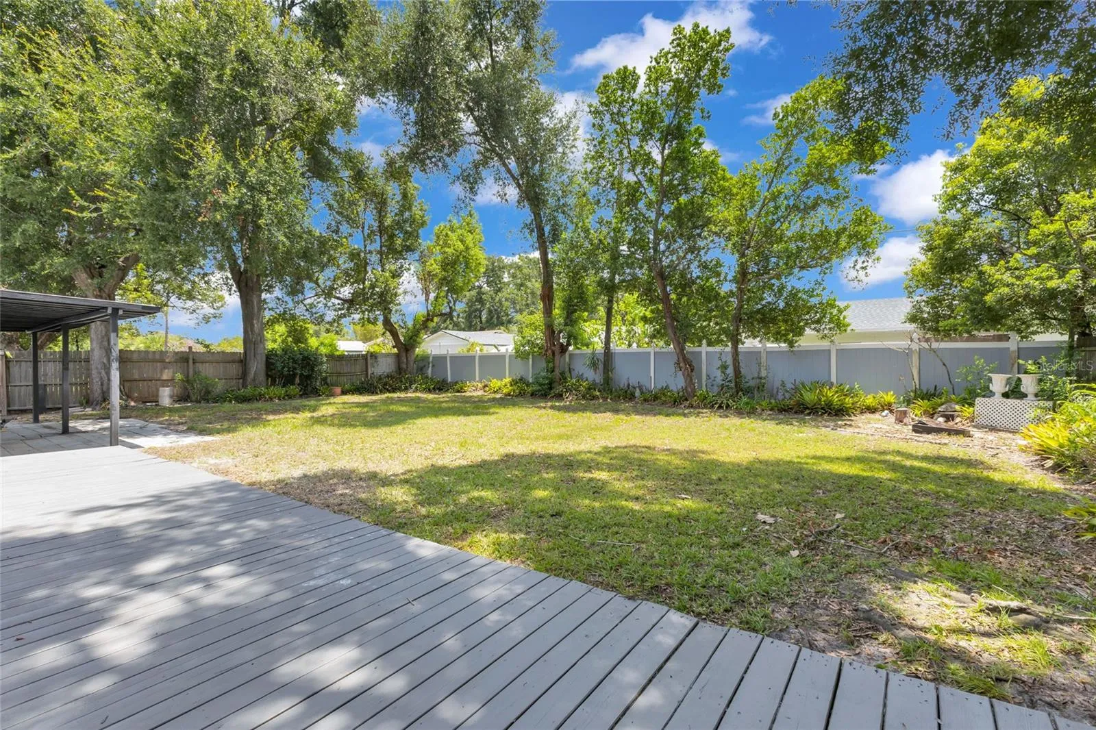 A huge backyard ready for your dream pool.