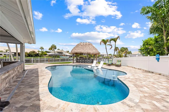 Salt Water Pool with sun deck and brick pavers