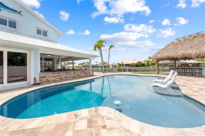 Salt Water Pool with sun deck and brick pavers