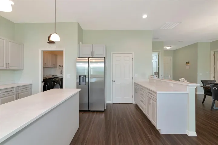 Large walk in pantry next to the fridge