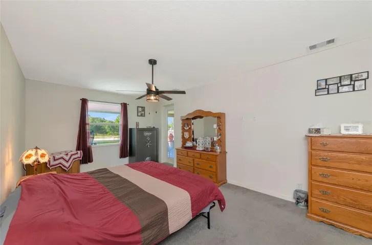 Primary bedroom with 2 walk in closets