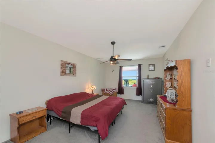 Primary bedroom with 2 walk in closets