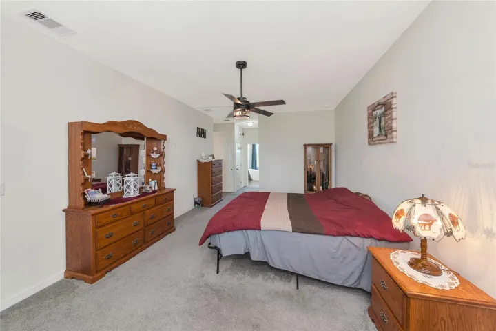 Primary bedroom with 2 walk in closets