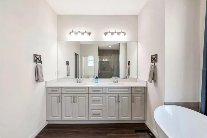 Huge primary bathroom with soaker tub and walk in shower