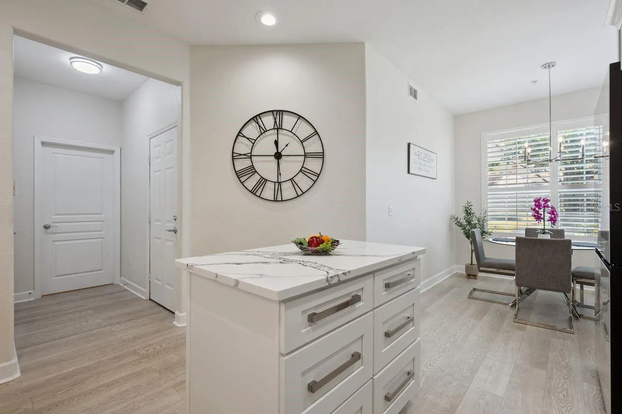 KITCHEN ISLAND WITH STORAGE SPACE.
