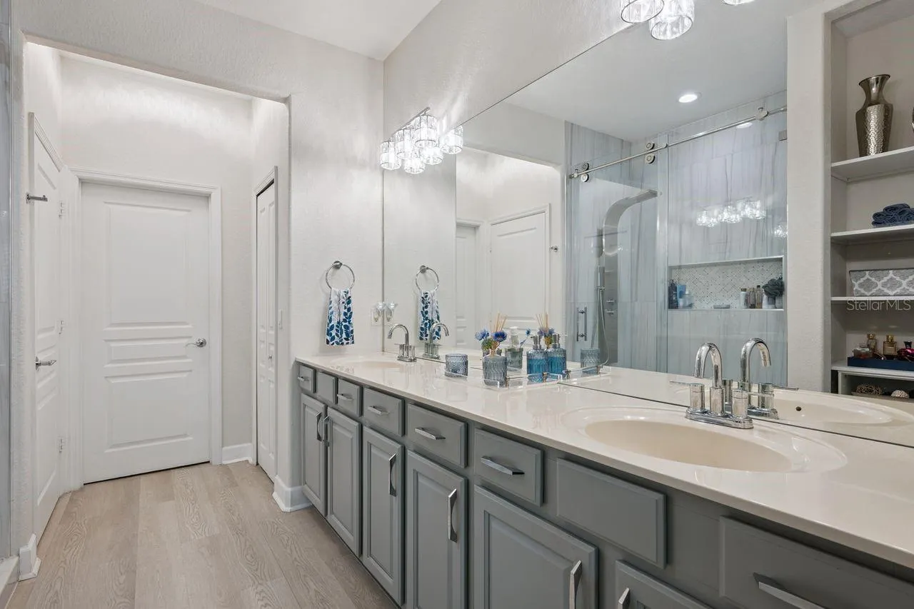 DUAL SINKS & HUGE WALK-IN SHOWER..