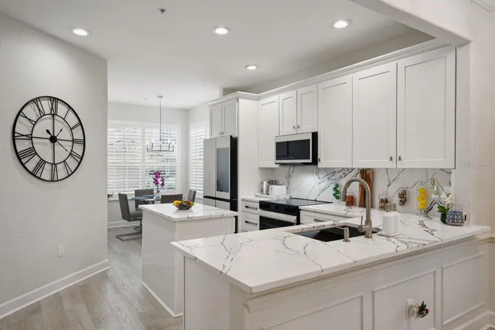 QUARTZ COUNTERTOPS AND NEWER APPLIANCES.