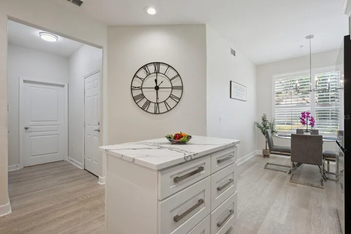 KITCHEN ISLAND WITH STORAGE SPACE.