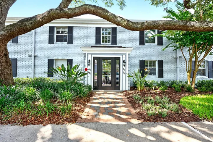 Recently UPDATED and ready for its next owner, this light-filled FIRST FLOOR condo unit offers LOW MAINTENANCE LIVING in the desirable Stratford community of Winter Park – with a monthly HOA that's lower than many comparable communities!