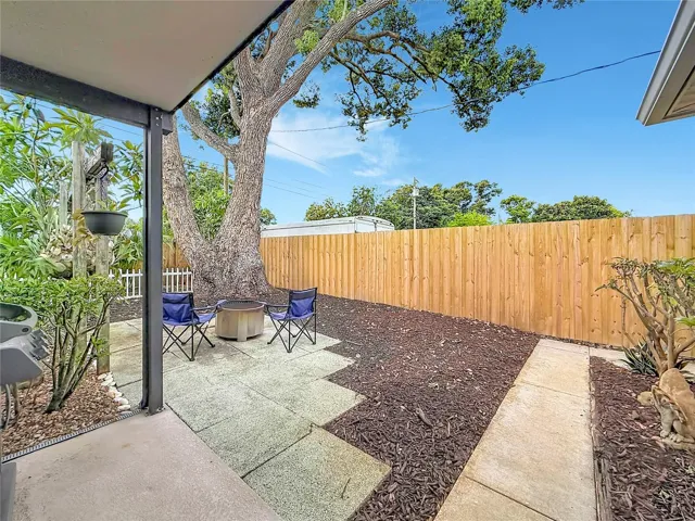 Right side of home back gate / Fire pit area