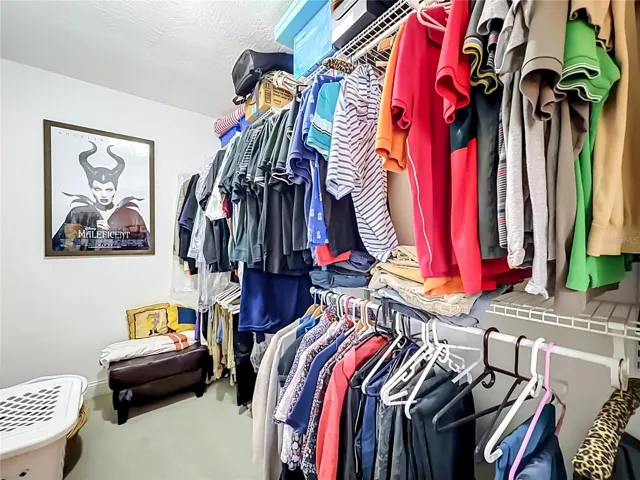 Primary Bedroom walk-in closet