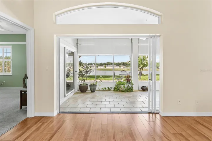 View of Lake Laemont Through Living Room and Florida Room.