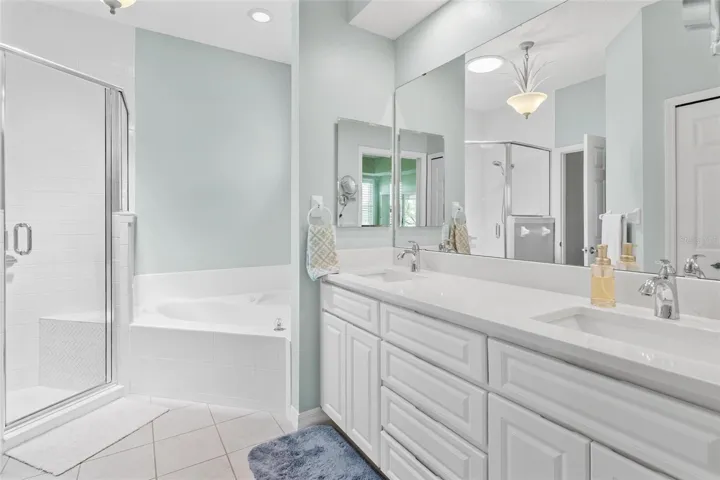Primary Bath with walk-in Shower, Jetted Tub, dual sinks
