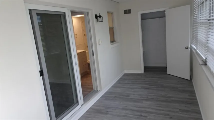 Florida room, sliders into master suite