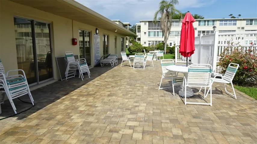 Nice patio between clubhouse and pool.