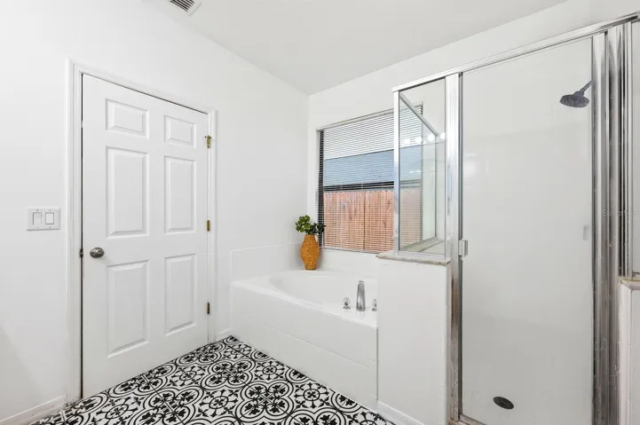 Primary en-suite bath.