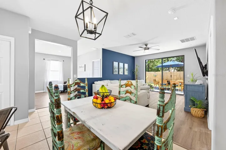Casual dining off the kitchen, open to the family room.