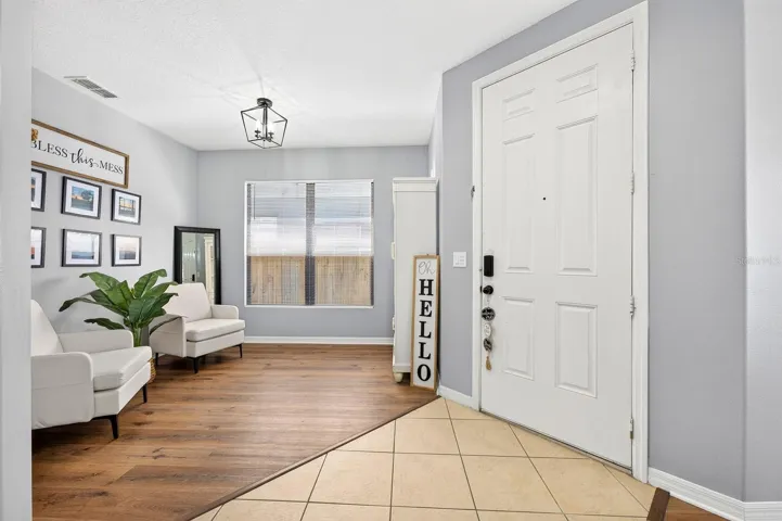 Versatile formal living at the front of the home.