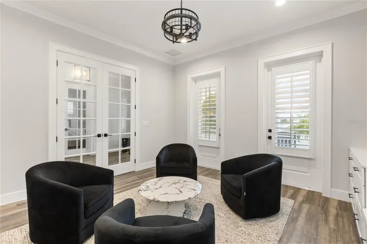 DEDICATED HOME OFFICE | MEETING SPACE.Just off the foyer, a private home office just off the foyer with room for focused work, client meetings or a substantial executive setup.